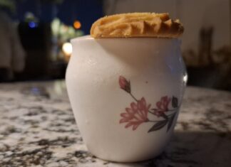 Cocktails in Jaipur: The Good, the Bad and the Overpriced Tipsy Tea Tale cocktail served in a delicate floral china teacup at Sura in Jaipur